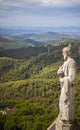 Barcelona, Spain - September 23, 2021: Stone statue on the roof of the Church of the Sacred Heart of Jesus on the summit of Parc Royalty Free Stock Photo